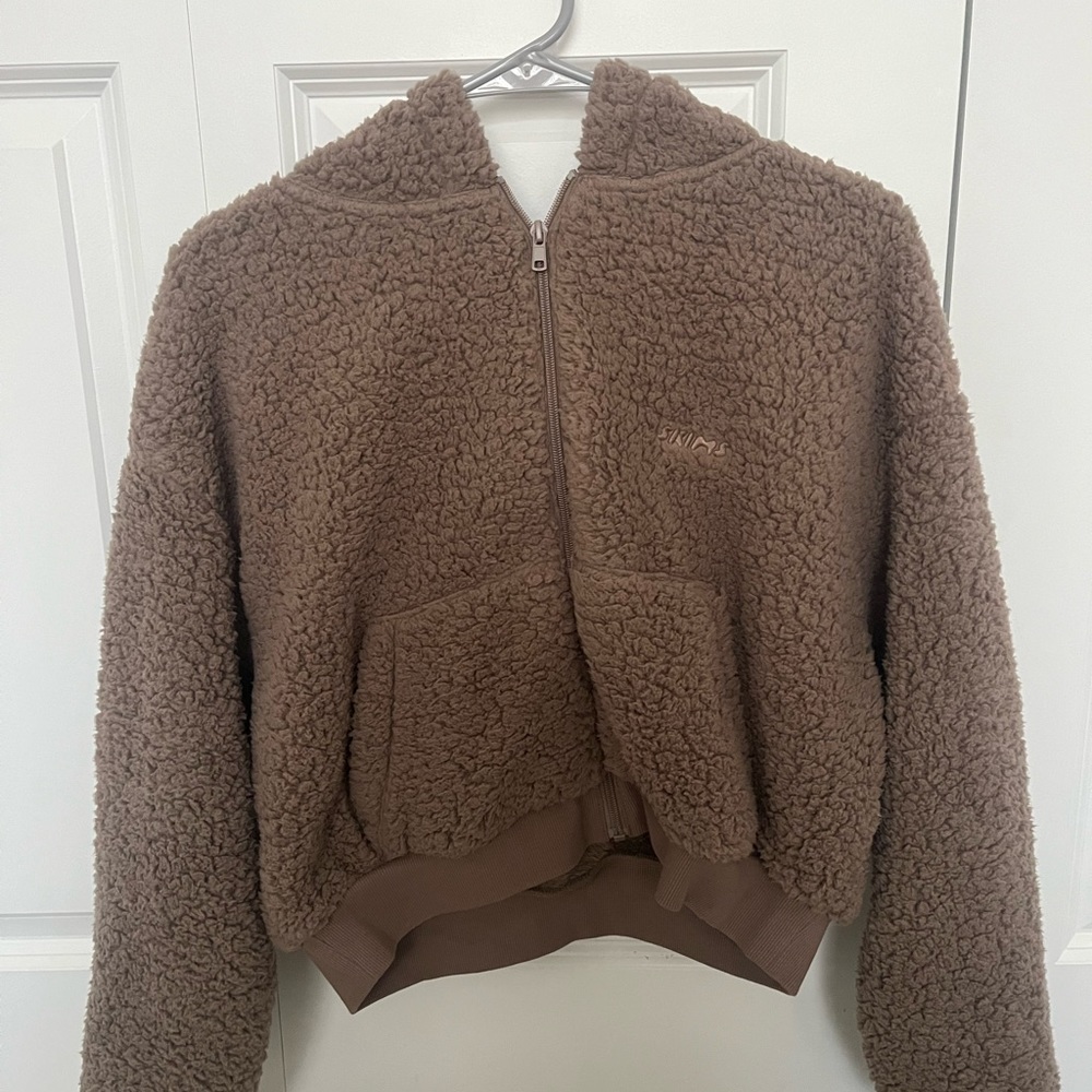 Skims zip up